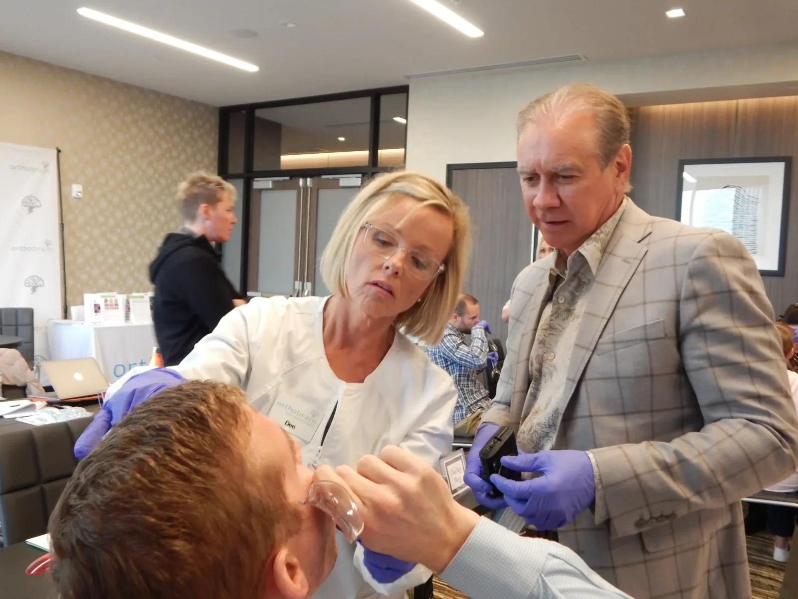 Educators leading a hands-on clinical course